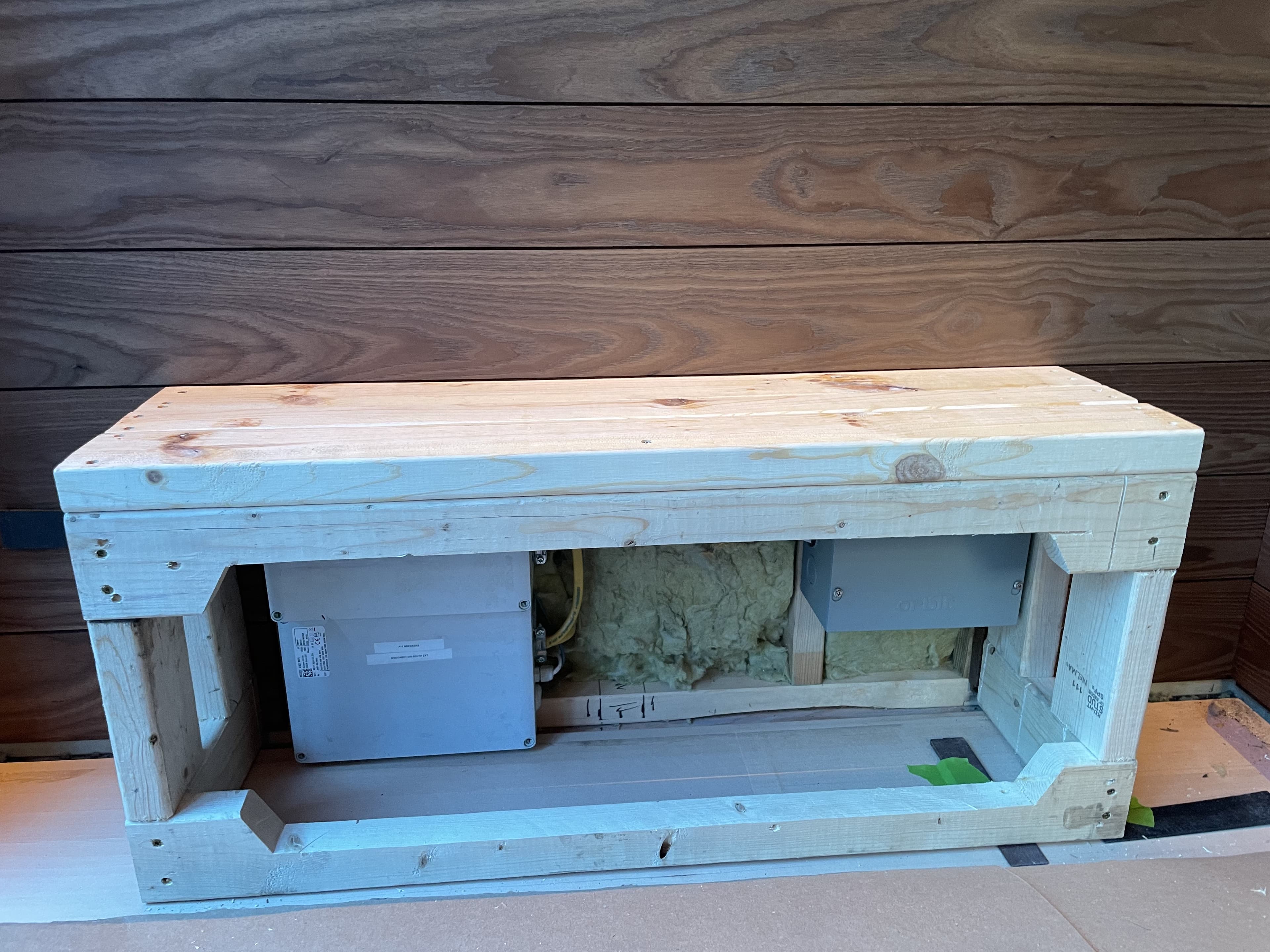 Bench frame showing electrical access opening